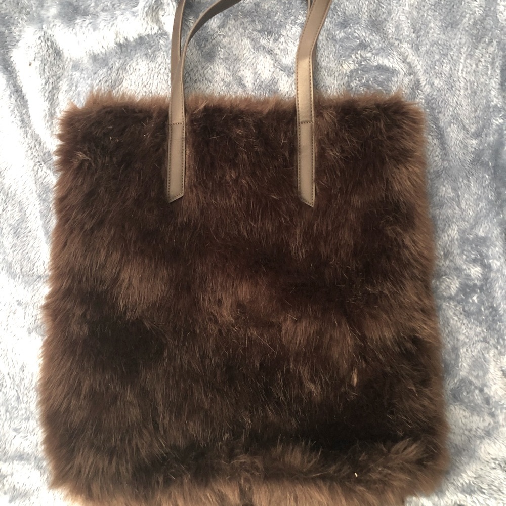 Brown faux fur 17x15 bag. Never used.